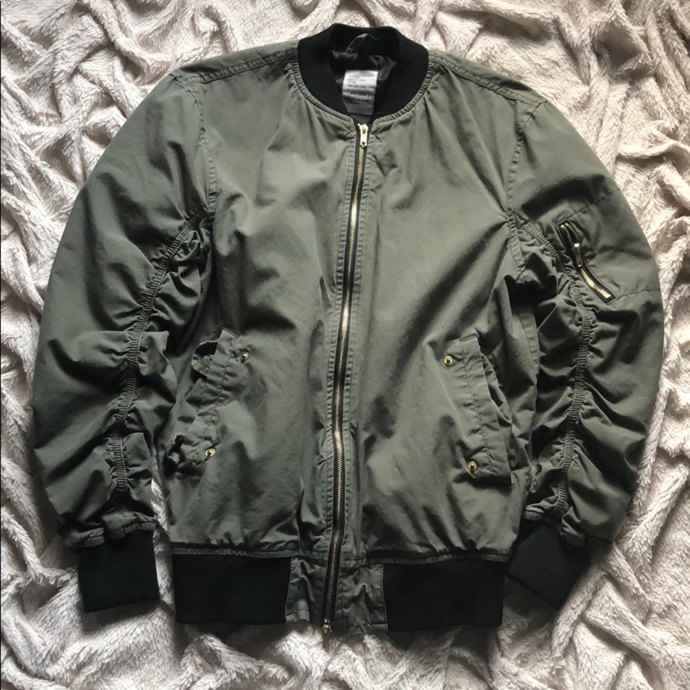 Black and green Coat.